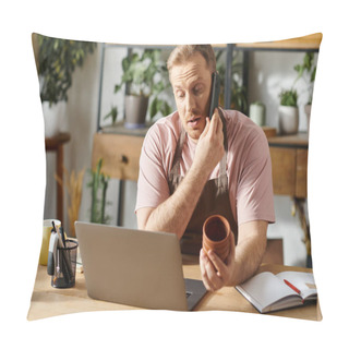 Personality  A Man In A Plant Shop Sits At A Table, Engrossed In A Phone Call. Pillow Covers