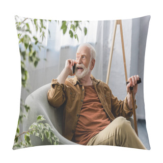 Personality  Selective Focus Of Happy Senior Man Sitting In Armchair And Talking On Smartphone Pillow Covers