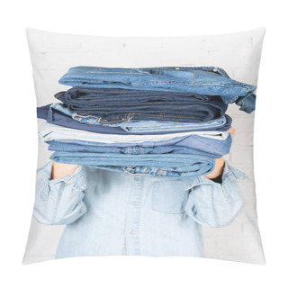 Personality  Partial View Of Woman Obscuring Face With Stack Of Denim Clothes Near White Brick Wall  Pillow Covers