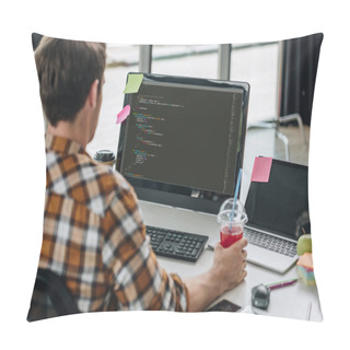 Personality  Back View Of Young Programmer Holding Glass Of Juice While Working On Computer In Office Pillow Covers