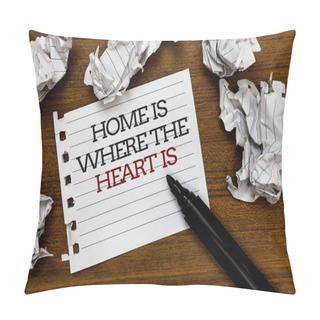 Personality  Text Sign Showing Home Is When The Heart Is. Conceptual Photo Your House Is Where You Feel Comfortable And Happy Paper Lumps Laid Randomly Around White Notepad Touch Black Pen On Woody Floor. Pillow Covers