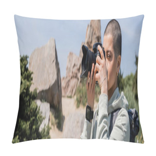 Personality  Young Tattooed And Short Haired Woman Hiker With Backpack Taking Photo On Digital Camera And Standing With Scenic Nature At Background, Banner, Translation Of Tattoo: Love Pillow Covers