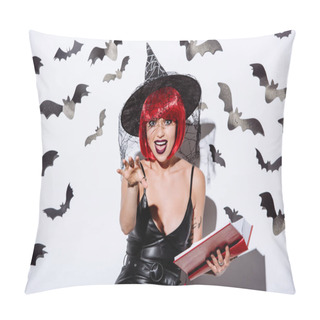 Personality  Girl In Black Witch Halloween Costume With Red Hair Holding Book Near White Wall With Decorative Bats Pillow Covers