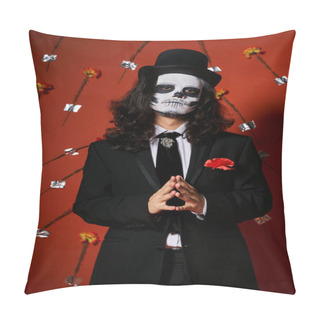 Personality  Elegant Man In Dia De Los Muertos Skull Makeup Looking At Camera In Red Studio With Carnations Pillow Covers