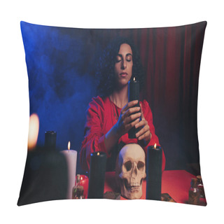 Personality  Oracle With Closed Eyes Holding Burning Candle Near Skull And Blue Smoke On Dark Background Pillow Covers