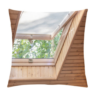 Personality  Opened Roof Window With Blinds Or Curtain In Wooden House Attic. Room With Slanted Ceiling Made Of Natural Eco Materials And Park View Through Opened Window. Environment Friendly House. Pillow Covers