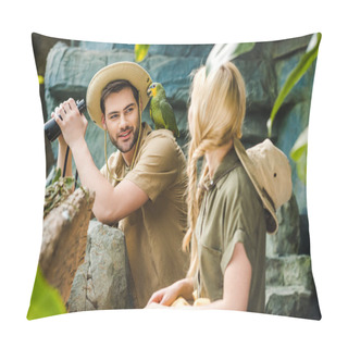 Personality  Young Man In Safari Suit With Parrot On Shoulder Flirting With Woman While Hiking In Jungle Pillow Covers