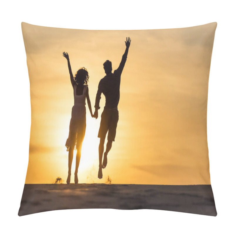 Personality  Silhouettes Of Man And Woman Jumping On Beach Against Sun During Sunset Pillow Covers