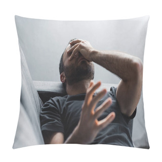 Personality  Depressed Man Suffering While Lying On Sofa And Holding Hand On Face Pillow Covers