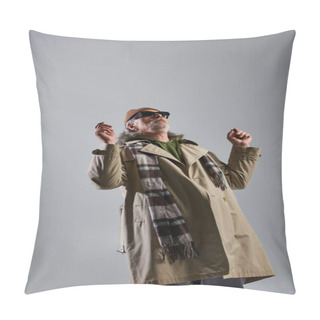 Personality  Expressive Personality, Senior And Bearded Hipster Man In Dark Sunglasses And Stylish Casual Outfit Looking Up While Standing On Grey Background, Fashionable And Positive Lifestyle Concept Pillow Covers
