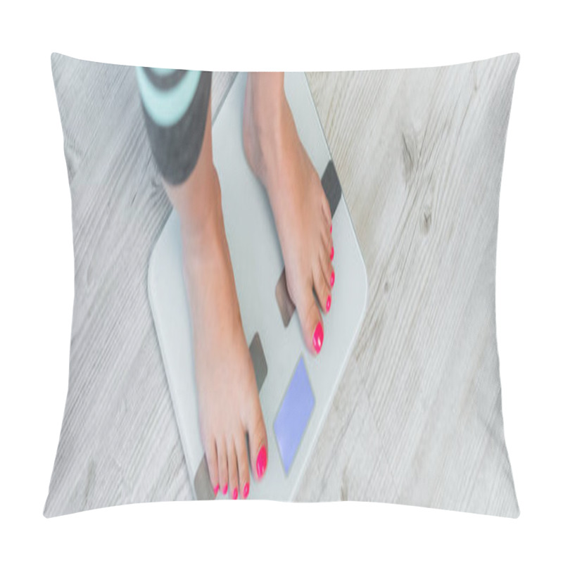 Personality  cropped view of barefoot woman estimating weight on floor scales, banner pillow covers