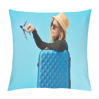 Personality  Blonde Happy Girl In Sunglasses And Straw Hat Plating With Toy Plane Near Blue Travel Bag Isolated On Blue Pillow Covers