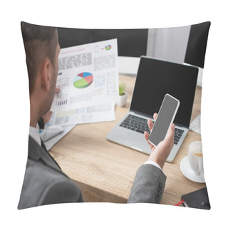 Personality  Partial View Of Trader Holding Smartphone And Infographics Near Laptop And Coffee Cup, Blurred Foreground Pillow Covers