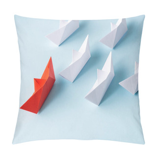 Personality  High Angle View Of Unique Red Paper Boat Among White On Blue Pillow Covers