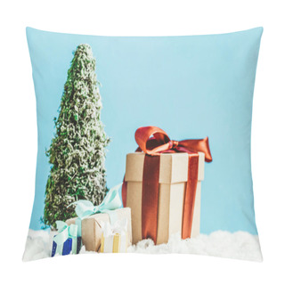 Personality  Close-up Shot Of Christmas Gifts And Miniature Christmas Tree Standing On Snow On Blue Background Pillow Covers