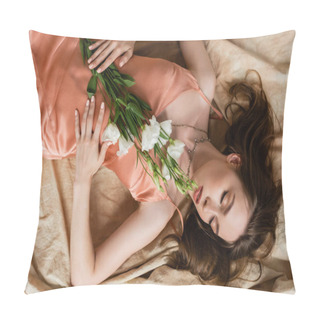 Personality  Top View Of Attractive Young Woman In Pink Silk Slip Dress Lying With Closed Eyes On Linen Fabric And Holding Delicate White Flowers On Beige Background, Sensuality, Elegance, Eustoma  Pillow Covers