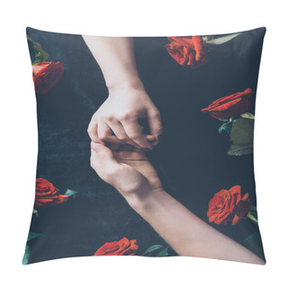 Personality  Cropped Shot Of Couple Holding Hands Above Black Fabric With Red Roses Pillow Covers