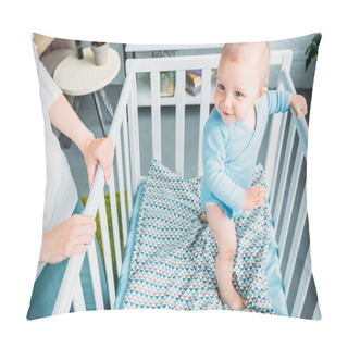 Personality  Cropped Shot Of Mother Standing Near Child In Crip At Home Pillow Covers