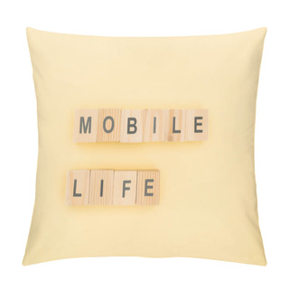Personality  Top View Of Mobil Life Lettering Made Of Wooden Cubes On Yellow Background Pillow Covers