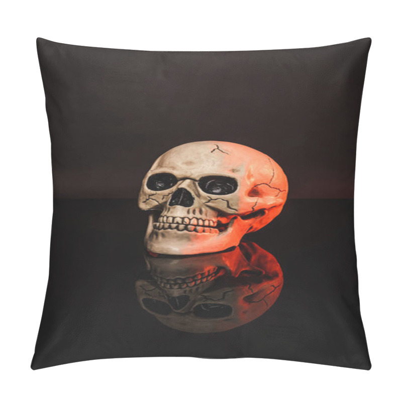 Personality  red lighting on aged and creepy skull on black  pillow covers