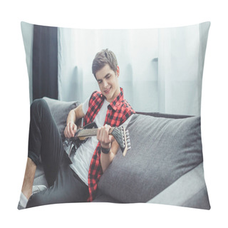 Personality  Happy Teenager Playing Electric Guitar While Sitting On Sofa At Home Pillow Covers