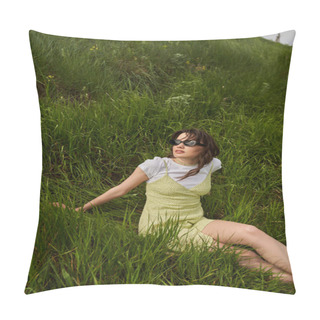 Personality  Stylish Brunette Woman In Sunglasses And Sundress Relaxing And Spending Time While Sitting On Hill With Green Grass At Background, Natural Landscape And Free-spirited Concept Pillow Covers