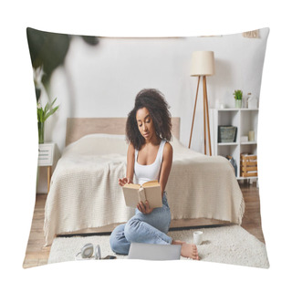 Personality  A Curly African American Woman In A Tank Top Sitting On The Floor, Engrossed In Reading A Book In A Modern Bedroom. Pillow Covers