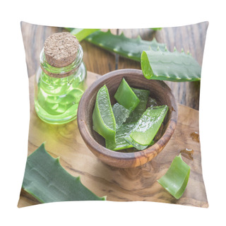 Personality  Fresh Aloe Leaves And Aloe Gel In The Cosmetic Jar On Wooden Table. Pillow Covers