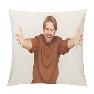 Personality  Let Me Embrace You! Portrait Of Happy Joyful Hospitable Bearded Man In Sweatshirt Standing With Outstretched Hands, Smiling And Welcoming With Free Hugs. Indoor Studio Shot Isolated On Gray Background Pillow Covers