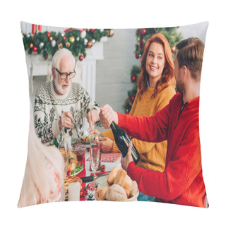 Personality  Selective Focus Of Woman Looking At Man Opening Champagne Bottle Near Relatives Pillow Covers