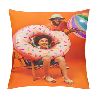 Personality  Positive Young African American Best Friends In Summer Outfits Holding Pool Ring And Ball While Sitting On Deck Chair And Looking At Camera On Orange Background, Fashion-forward Friends Pillow Covers