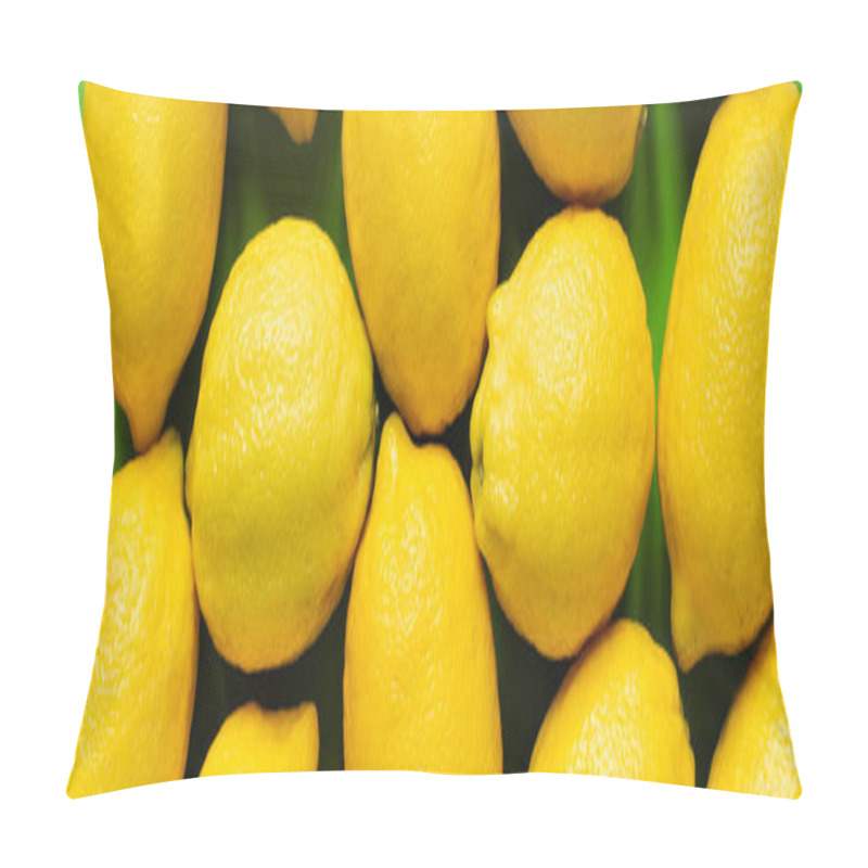 Personality  top view of ripe yellow lemons on green background, panoramic crop pillow covers