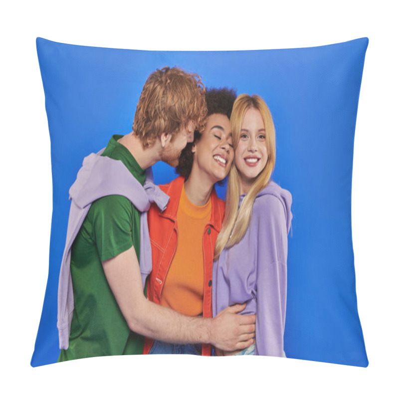 Personality  polyamory concept, positive multicultural women and redhead man hugging on blue background, studio photography, cultural diversity, polygamy, modern family, colorful clothes  pillow covers