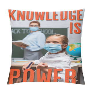Personality  Selective Focus Of Schoolgirl In Medical Mask Looking At Camera While Teacher Standing Near Chalkboard And Knowledge Is Power Lettering  Pillow Covers