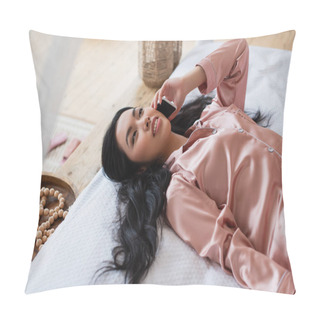 Personality  Young Asian Woman In Silk Pajamas Lying On Bed And Speaking On Cellphone In Bedroom Pillow Covers