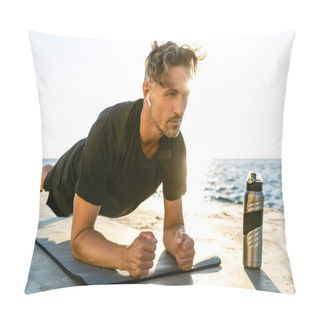 Personality  Handsome Adult Sportsman With Wireless Earphones Doing Plank Exercise On Seashore Pillow Covers