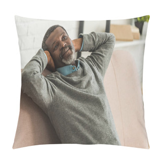 Personality  Dreamy, Positive African American Man Looking Away While Sitting On Sofa Pillow Covers