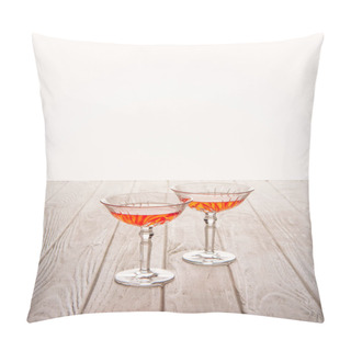 Personality  Close-up Shot Of Glasses Of Wine On Wooden Table On White Pillow Covers