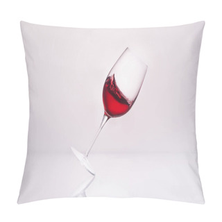Personality  Inclined Wineglass With Splashing Red Wine On Reflective Surface And On White Pillow Covers