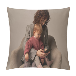 Personality  Multitasking, Smartphone User, Modern Working Mother, Balancing Work And Life Concept, Curly Woman In Suit Sitting With Toddler Daughter On Armchair, Grey Background, Parent And Child   Pillow Covers