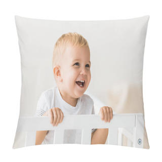 Personality  Cheerful Toddler Standing In Baby Crib On White Background Pillow Covers