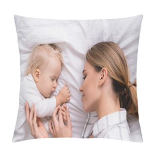 Personality  Top View Of Happy Woman Touching Hand Of Little Son Sleeping On White Bedding Pillow Covers
