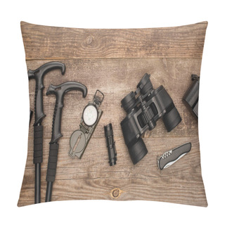 Personality  Top View Of Axe, Trekking Poles, Compass, Flashlight, Binoculars, Jackknife And Photo Camera On Wooden Table  Pillow Covers