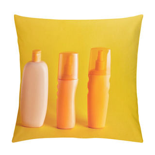 Personality  Suntan Cosmetics In Bottles On Dark Yellow Background Pillow Covers