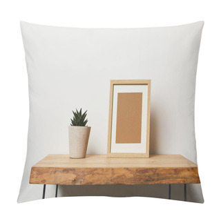 Personality  Green Plant Near Frame On Wooden Table At Home Pillow Covers