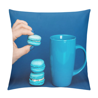 Personality  Cropped View Of Woman Holding French Macaroon Near Cup On Blue Background  Pillow Covers