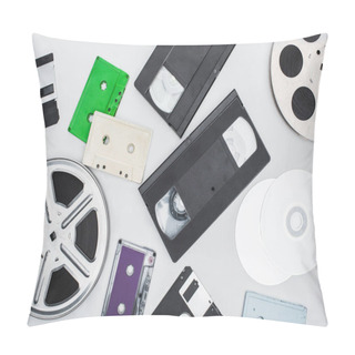 Personality  Flat Lay Of VHS Cassettes, Diskettes, CD Discs, Film Reels And Colorful Cassettes On White Background Pillow Covers