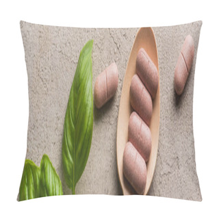 Personality  Panoramic Shot Of Green Leaves And Pills In Wooden Spoon On Concrete Background, Naturopathy Concept Pillow Covers