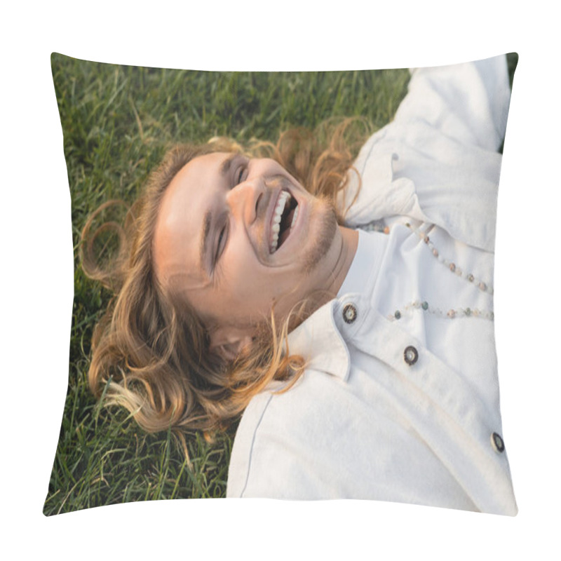 Personality  High Angle View Of Happy Man In White Shirt And Beads Lying On Green Grass Outdoors Pillow Covers
