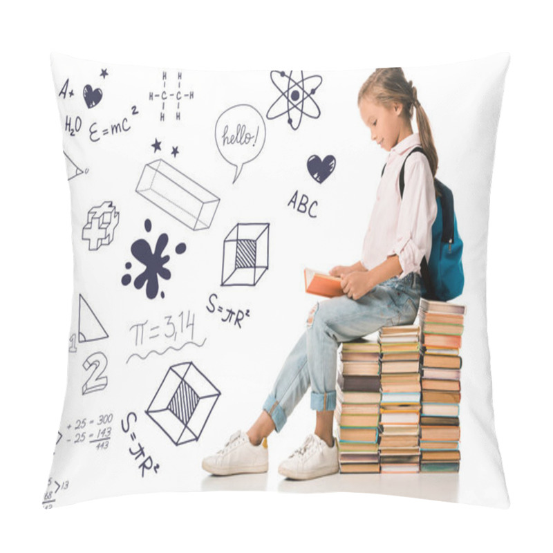 Personality  cheerful schoolkid sitting on books and reading near letters and mathematical formulas  on white  pillow covers